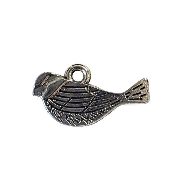 Silver bird-shaped pendant on a light gray background