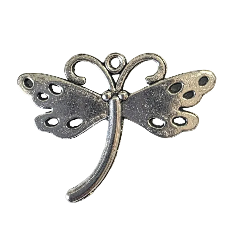 Silver dragonfly-shaped pendant on a light gray background