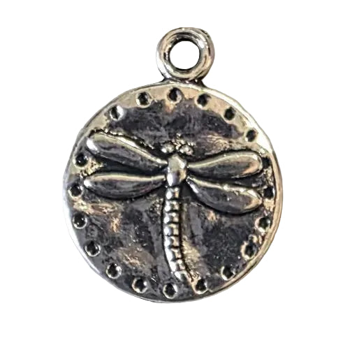 Silver dragonfly pendant on a light gray background