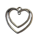 Silver heart-shaped pendant on a light gray background