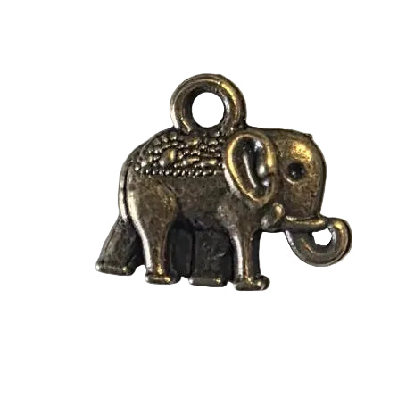 Small bronze-colored charm with a gemstone on a light gray background