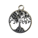 Silver tree of life pendant on a gray background
