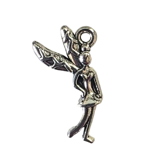 Silver charm of a fairy on a white background