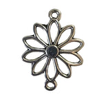 Silver floral pendant on a light gray background
