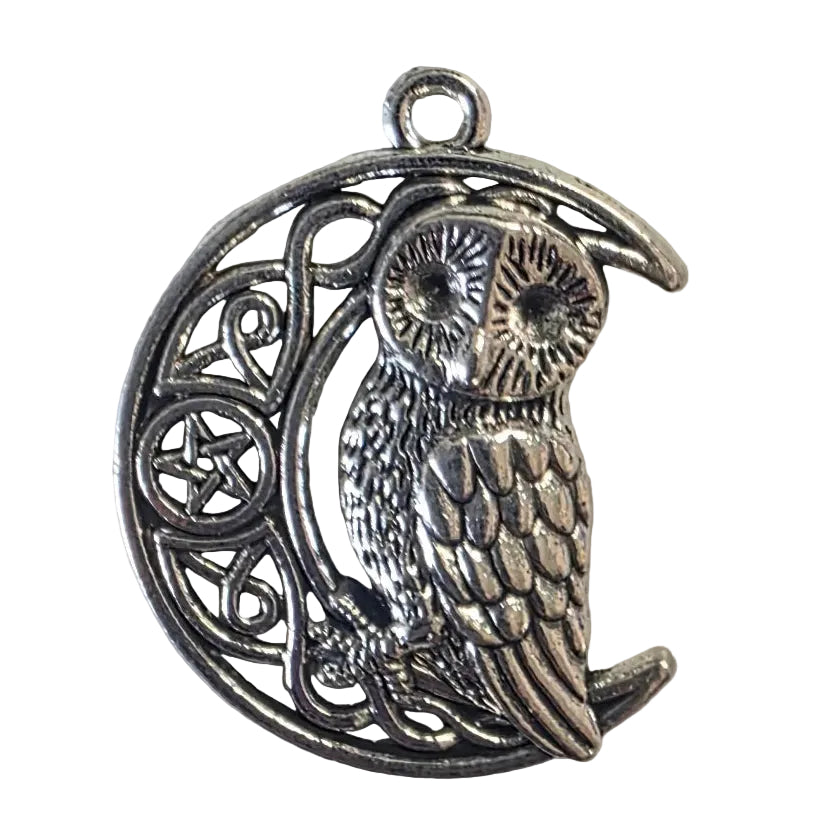 Silver owl sitting on a crescent moon pendant on a white background