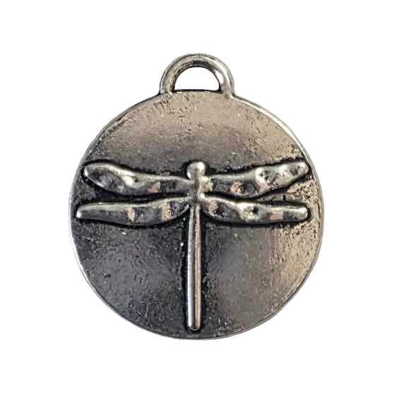 Silver dragonfly pendant on a gray background