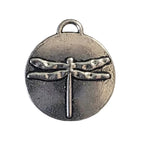 Silver dragonfly pendant on a gray background